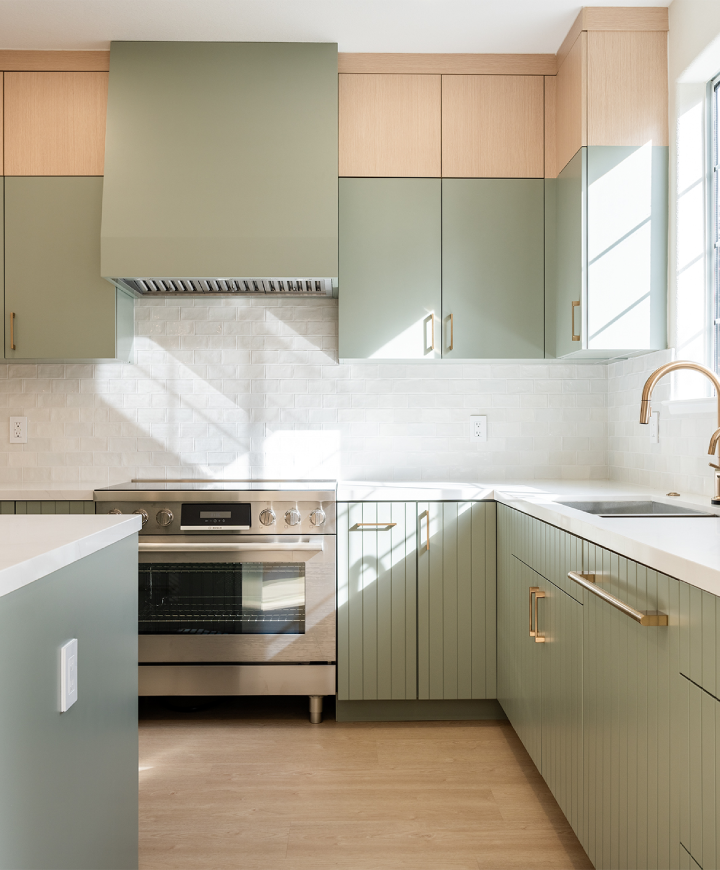 San Diego kitchen remodeling san diego with sage green cabinets, white quartz countertops, and natural wood accents by San Diego general contractor